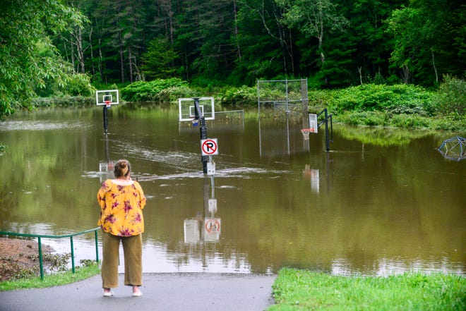 Karen Mather, Of Amherst, Nh, Takes Video Of Flooding From The North Branch Deerfield River In Wilmington, Vt., Monday, July 10, 2023.